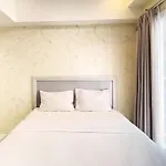 Comfy Studio Room At Grand Asia Afrika Apartment By Travelio