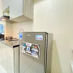 Comfy Studio Room At Grand Asia Afrika Apartment By Travelio