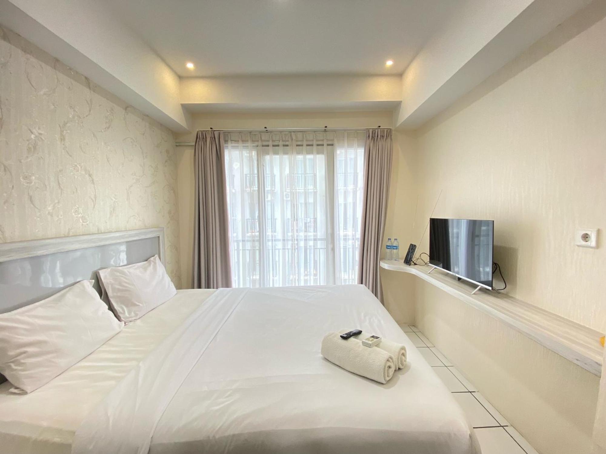 Comfy At Grand Afrika By Travelio Apartemen *